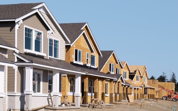 New homes under construction in a suburban Orange County neighborhood